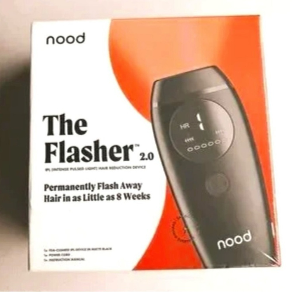 The flasher laser hair remover. Open box, black. Never used